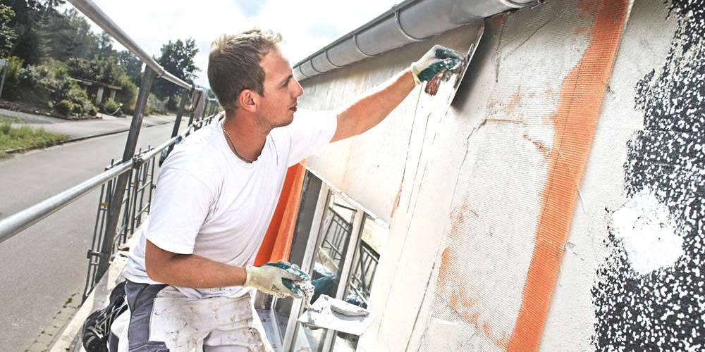 afwerking buitenmuur bezetten